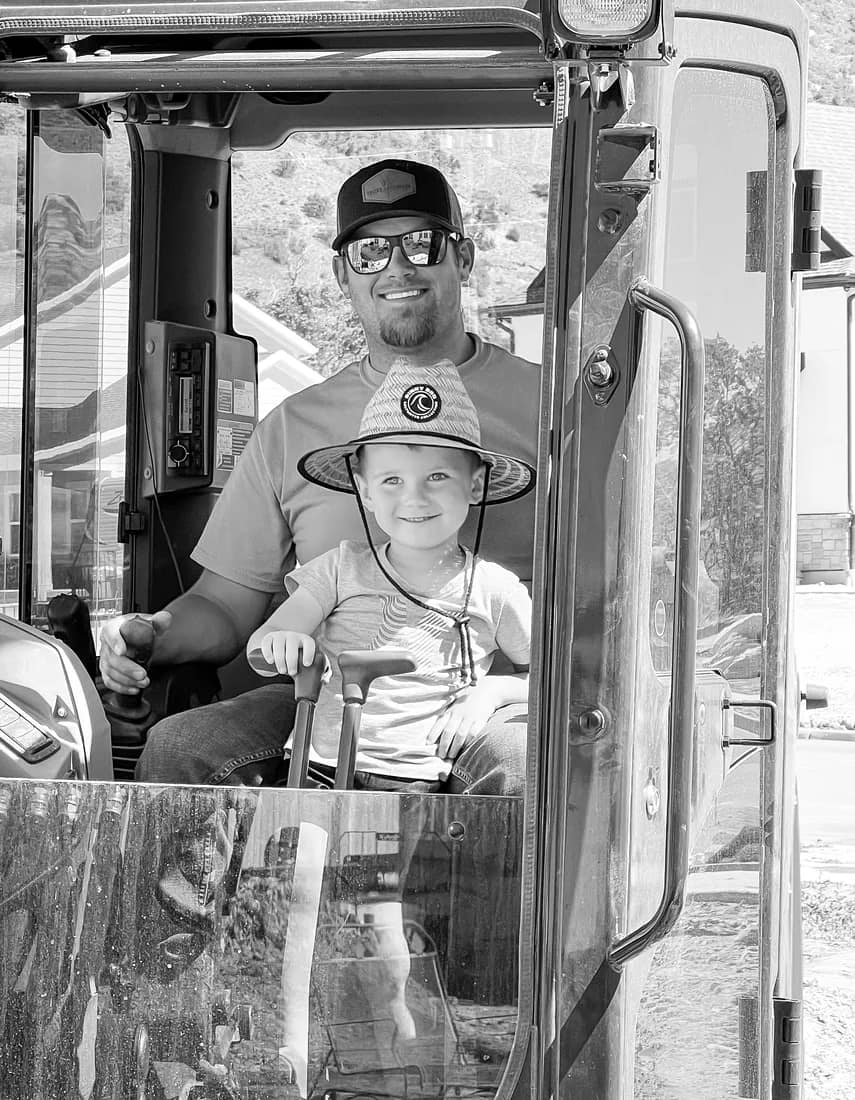 Jesse Felter and his son on the job